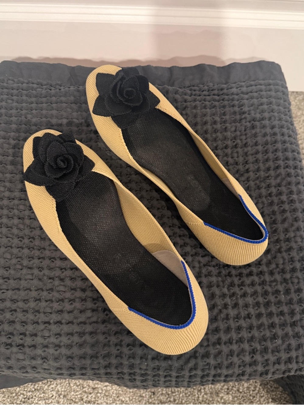 Rothy's Beige Ballet Flats with Black Rosette and Blue Trim